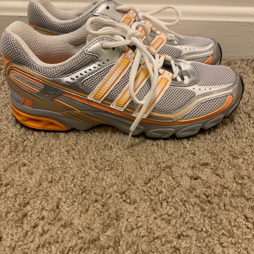 Adidas gym shoes.